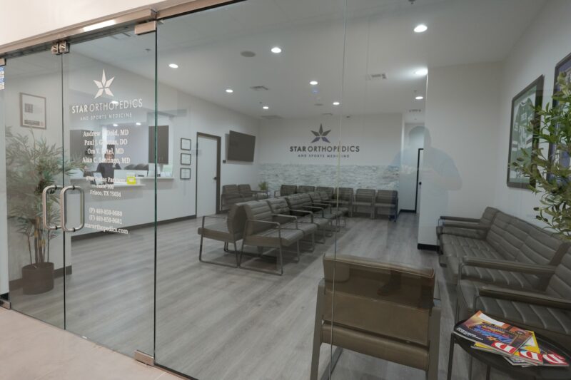 View through the glass entrance doors into the waiting room