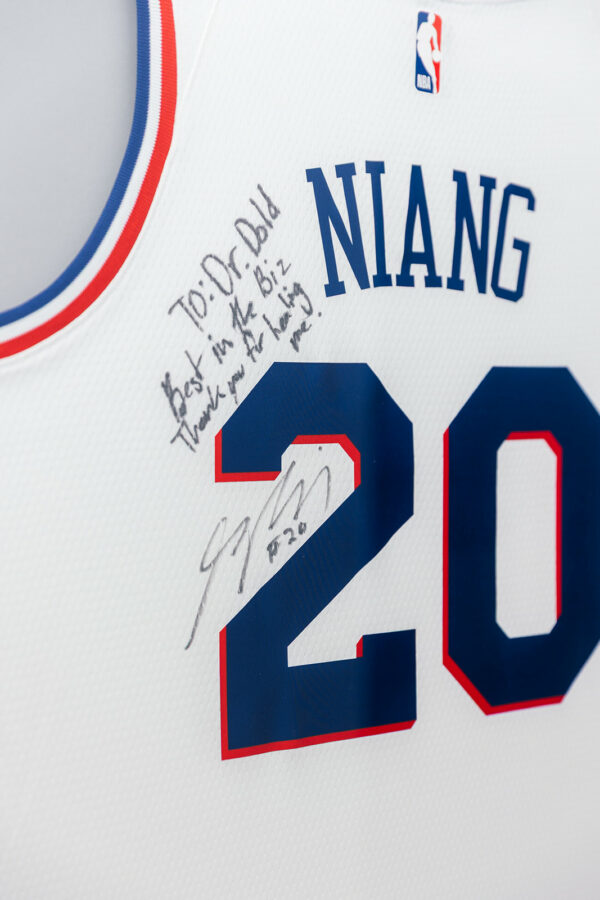 Signed Philadelphia 76ers jersey with a note to Dr. Dold