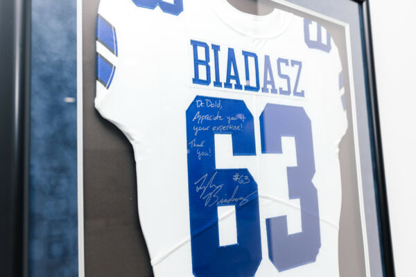 Signed Dallas Cowboys jersey with a note to Dr. Dold