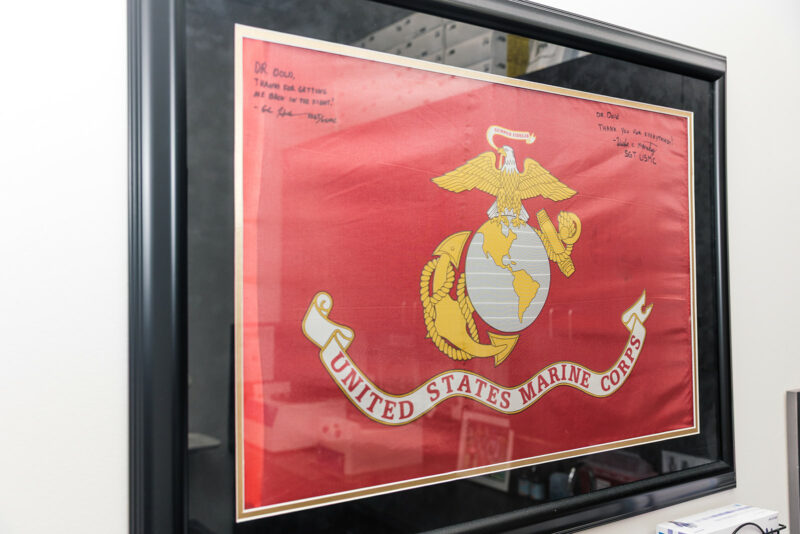 U.S. Marine Corps flag with handwritten thank-you notes to Dr. Dold
