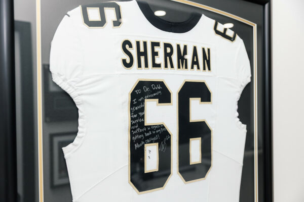 Signed New Orleans Saints jersey with a note to Dr. Dold